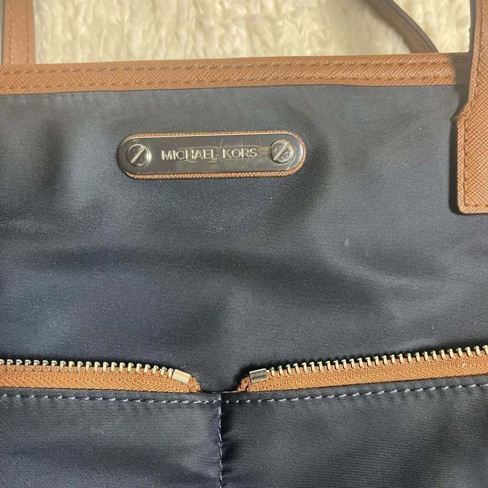 Michael Kors  Nylon Navy Blue Tote with leather Brown Trim and straps ..